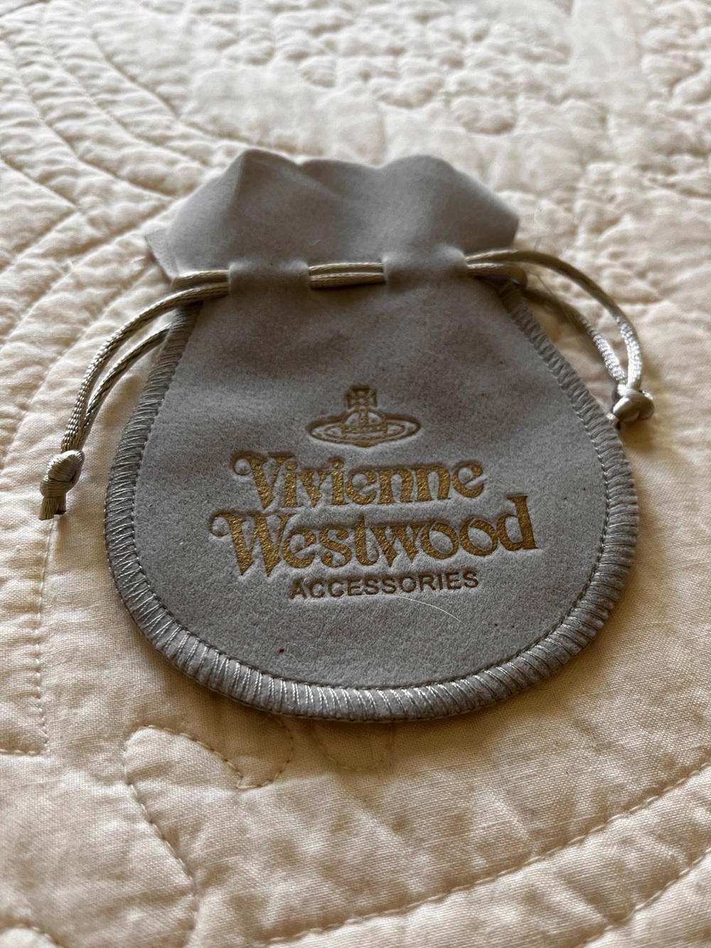 Vivienne Westwood Jewelry Storage Drawstring Bag. Gray & Gold. 3-1/2”x4-1/2”